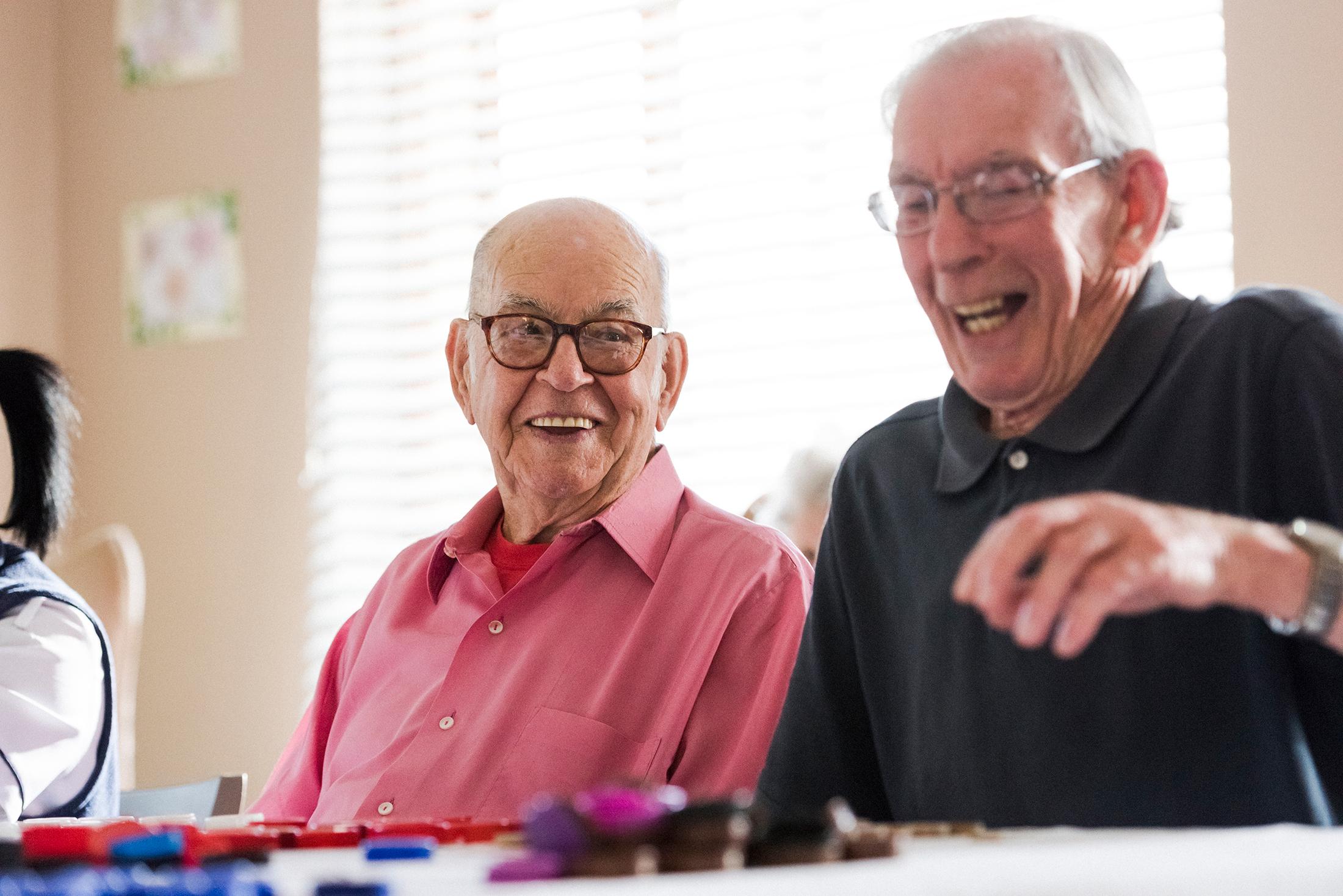 Senior adults playing games together